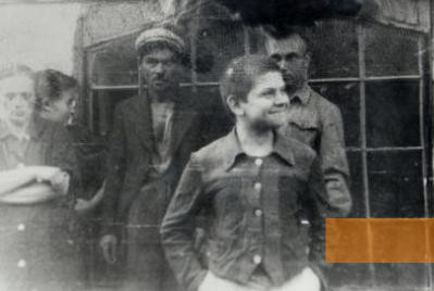 Image: Boryslav, 1943, Jewish forced labourers after their hiding place is discovered, among them Sabina Haberman (left, in profile), USHMM