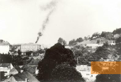 Image: Hadamar, 1941, Covertly taken photo of the smoking crematorium chimney at the killing centre, Diözesanarchiv Limburg