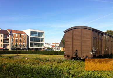 Image: Drancy, 2012, Freight train car with the documentation centre in the background, Mémorial de la Shoah, Pierre Marquis