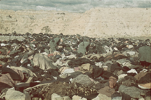 Babi Yar, end of September 1941, Members of the German order police search the clothing of murdered Jews, Hamburger Institut für Sozialforschung
